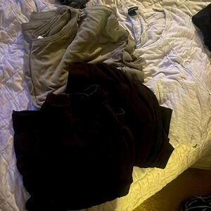 Woman’s grey long sleeve, green T, 2 black leggings. Comfy